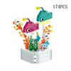 A set of 174 plastic building blocks shaped like rose flowers in various colors and sizes.