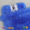 A close-up of bright blue chunky faux fur yarn with a label showing the brand Snow Fox.