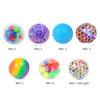 Seven colorful tactile water bead stress balls in various colors and textures