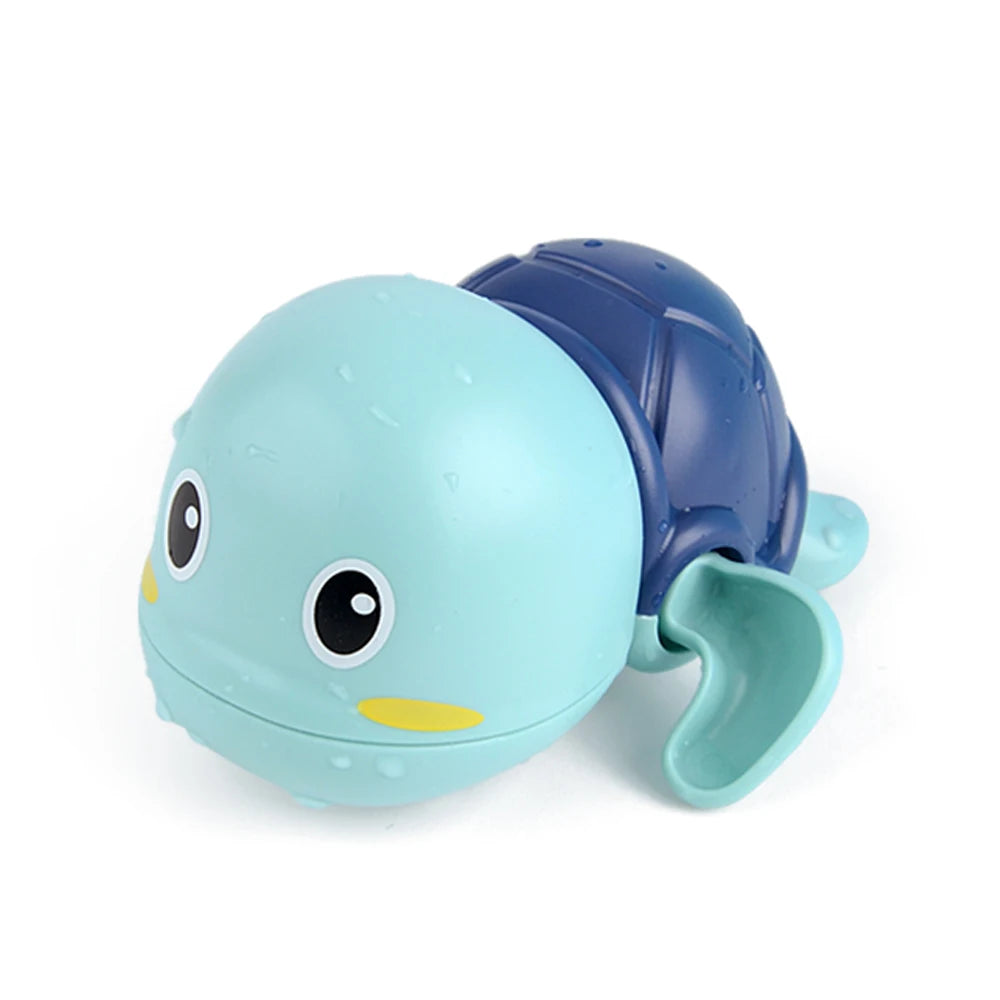A light blue cartoon monkey shower toy with a blue water sprinkler component.