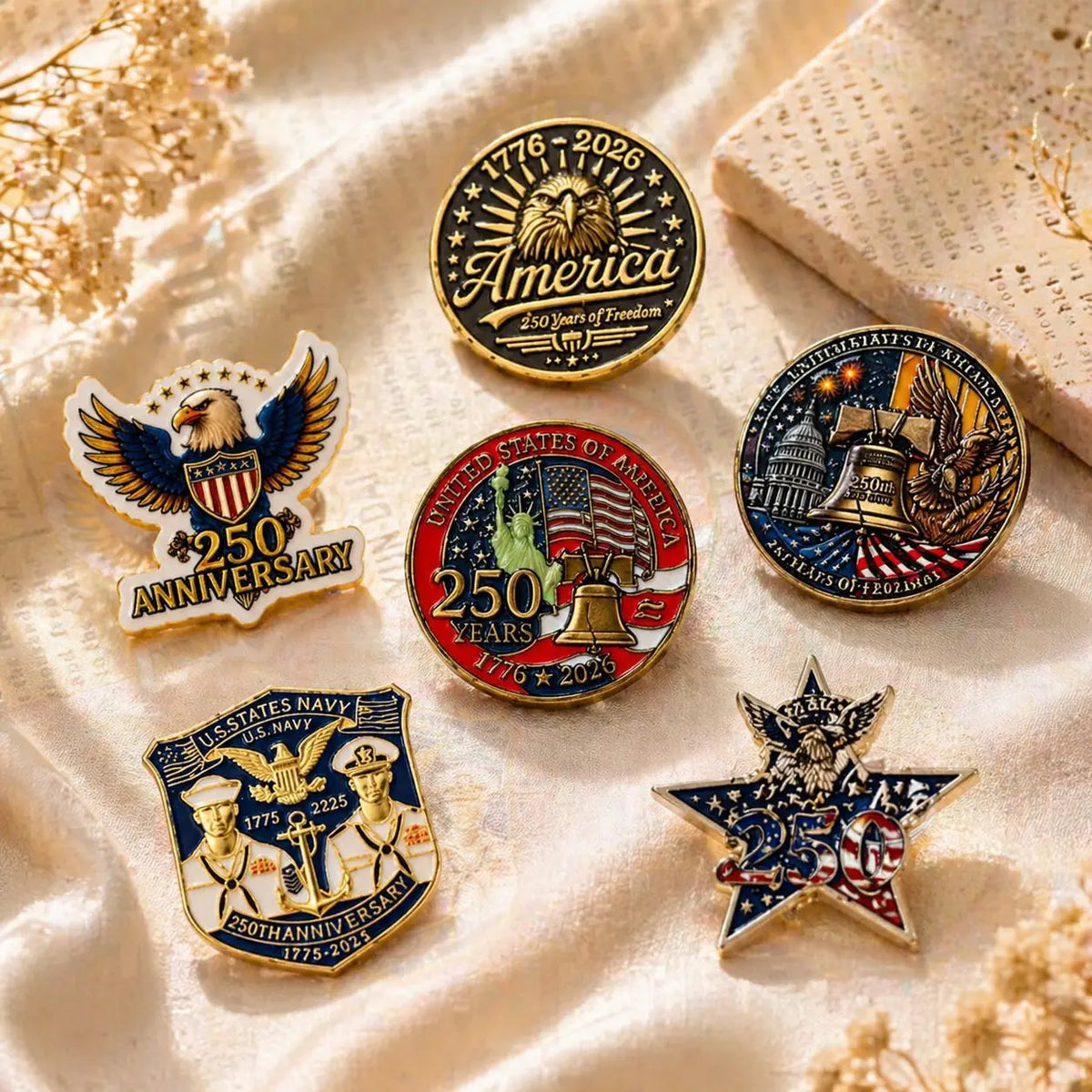 A set of patriotic lapel pins featuring designs for America's 250th anniversary, U.S. Navy, and other patriotic themes on a s