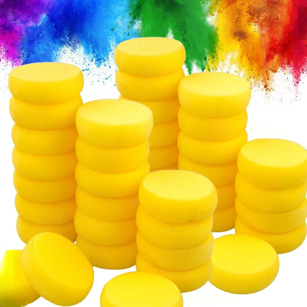 A collection of yellow soft dense paint sponges stacked in various sizes and scattered on a white background.