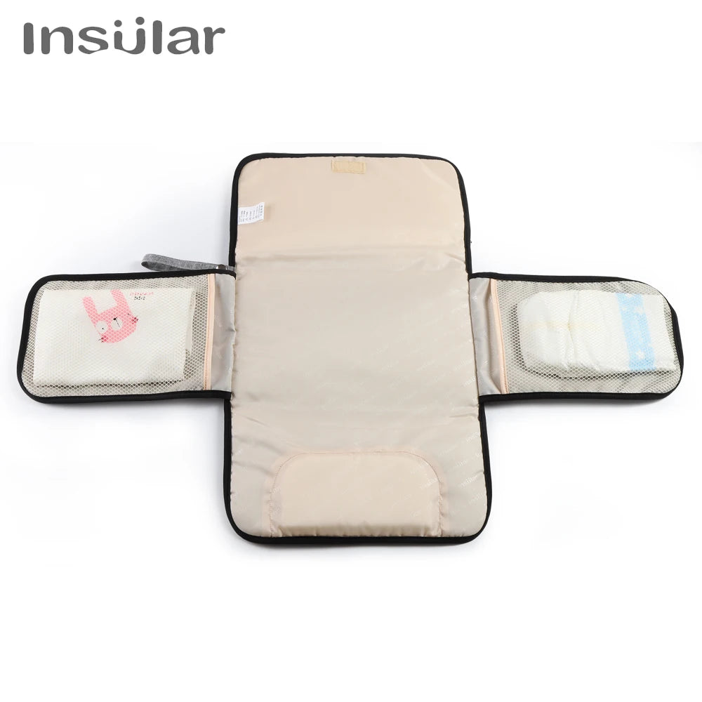 A beige portable 2-in-1 baby changing mat with storage bag shown flat.