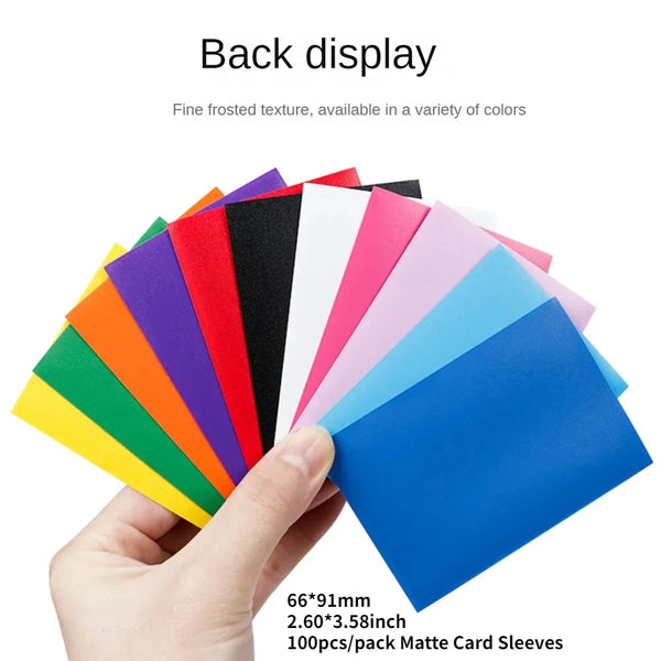 A hand holds a fan of colorful matte card sleeves in various colors like red, green, purple, and blue.
