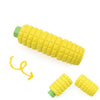 A set of yellow magnetic wooden fruit and vegetable cutting toys.