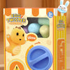 A box of Gashapon Fun and Joy Egg Twisting Machine toy featuring a yellow egg character and various plastic eggs.
