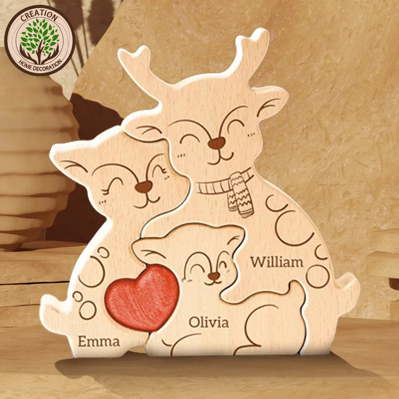 A wooden puzzle decoration featuring three stylized elk figures with names Emma, Olivia, and William.