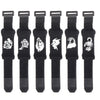 A set of black guitar string dampeners with adjustable tension visible side by side.