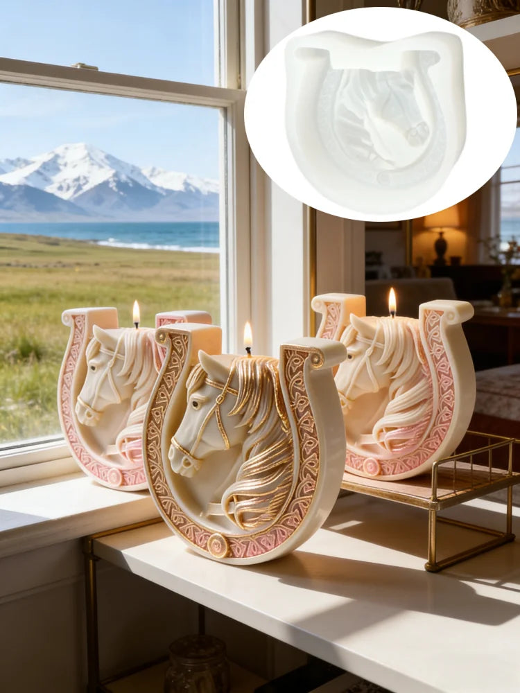 A set of white ceramic candle molds shaped like horses with Celtic knot designs displayed on a windowsill.