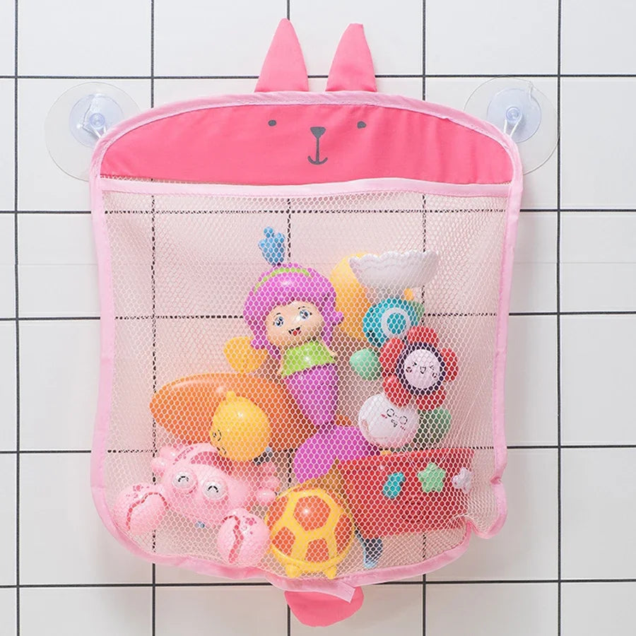 Pink mesh storage bag with duck ears and frog features, featuring suction cups for bathroom toys.