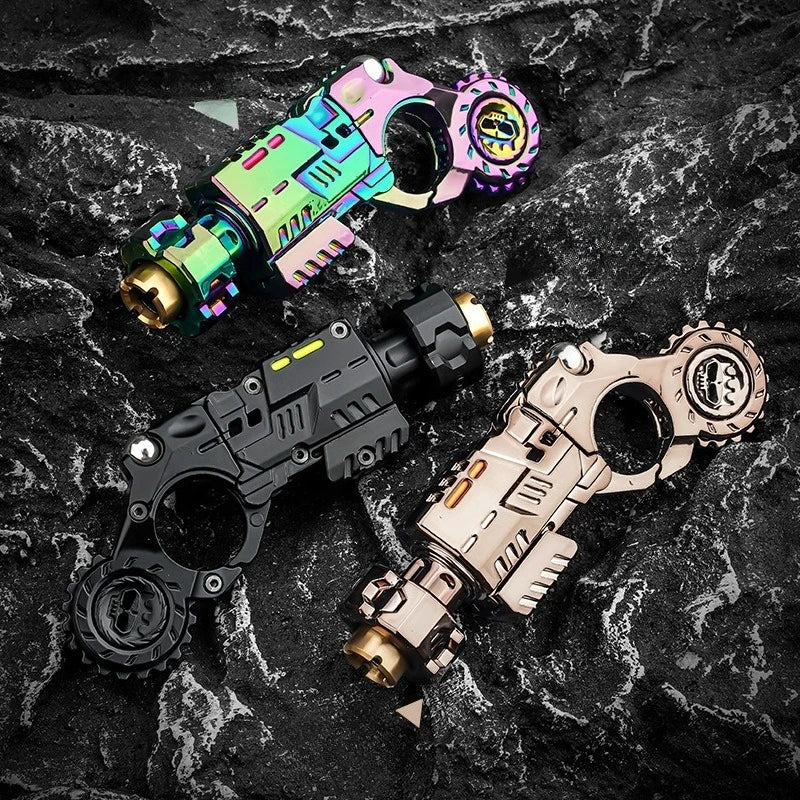 A set of metallic toy pistols and fidget spinners displayed on a dark, textured surface.