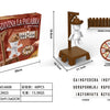 A box and components for a magnetic hangman board game including cards and wooden pieces.