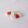 Two heat-resistant oven roasting bags with red markings for meat cooking