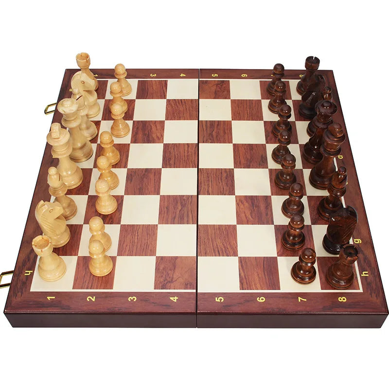 Handcrafted wooden folding chess set with solid walnut pieces on a wooden board