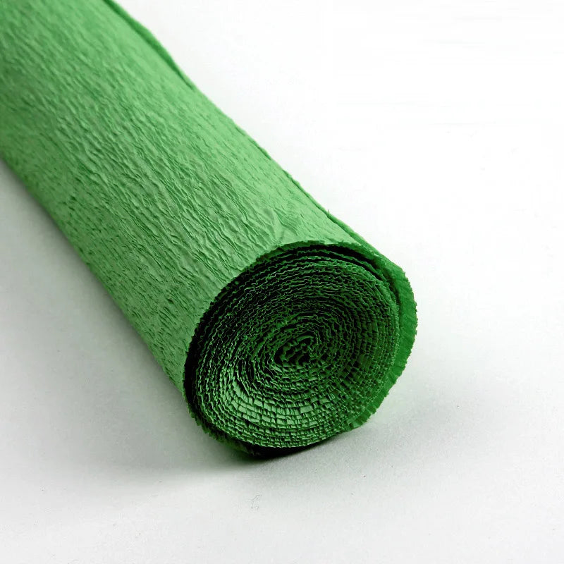 A roll of vibrant green crepe paper for DIY crafts and gift wrapping.