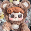 A fluffy brown plush blind box featuring a cute animal-like doll head with large eyes and soft fur.