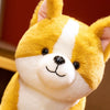 A yellow and white soft Corgi plush pillow with large ears and a friendly expression.