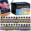 A collection of 24 tubes of acrylic paint in various colors displayed next to a painting on an easel.