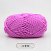 A ball of bright pink pre-dyed milk cotton yarn for knitting and crochet.