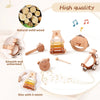A set of wooden musical instruments including a bear, a wood block, and a disc with five musical notes.