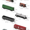 A collection of vintage steam train models in various sizes and colors, including locomotives and freight cars.