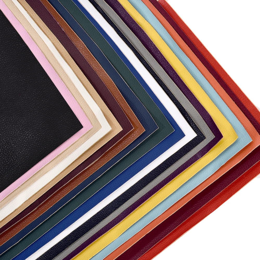 A fan of self-adhesive PU leather repair patches in a variety of colors and shades.