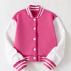 A pink and white knitted cardigan with a collar and ribbed cuffs.