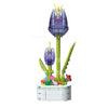 A purple rose flower building block bouquet set featuring a large purple flower and green stems.
