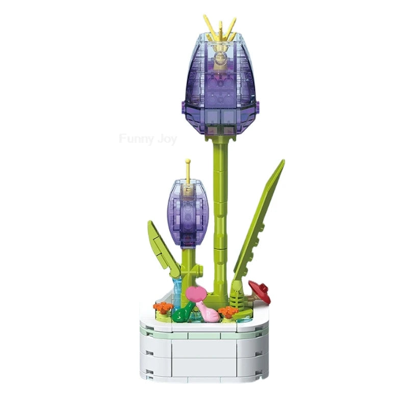A purple rose flower building block bouquet set featuring a large purple flower and green stems.