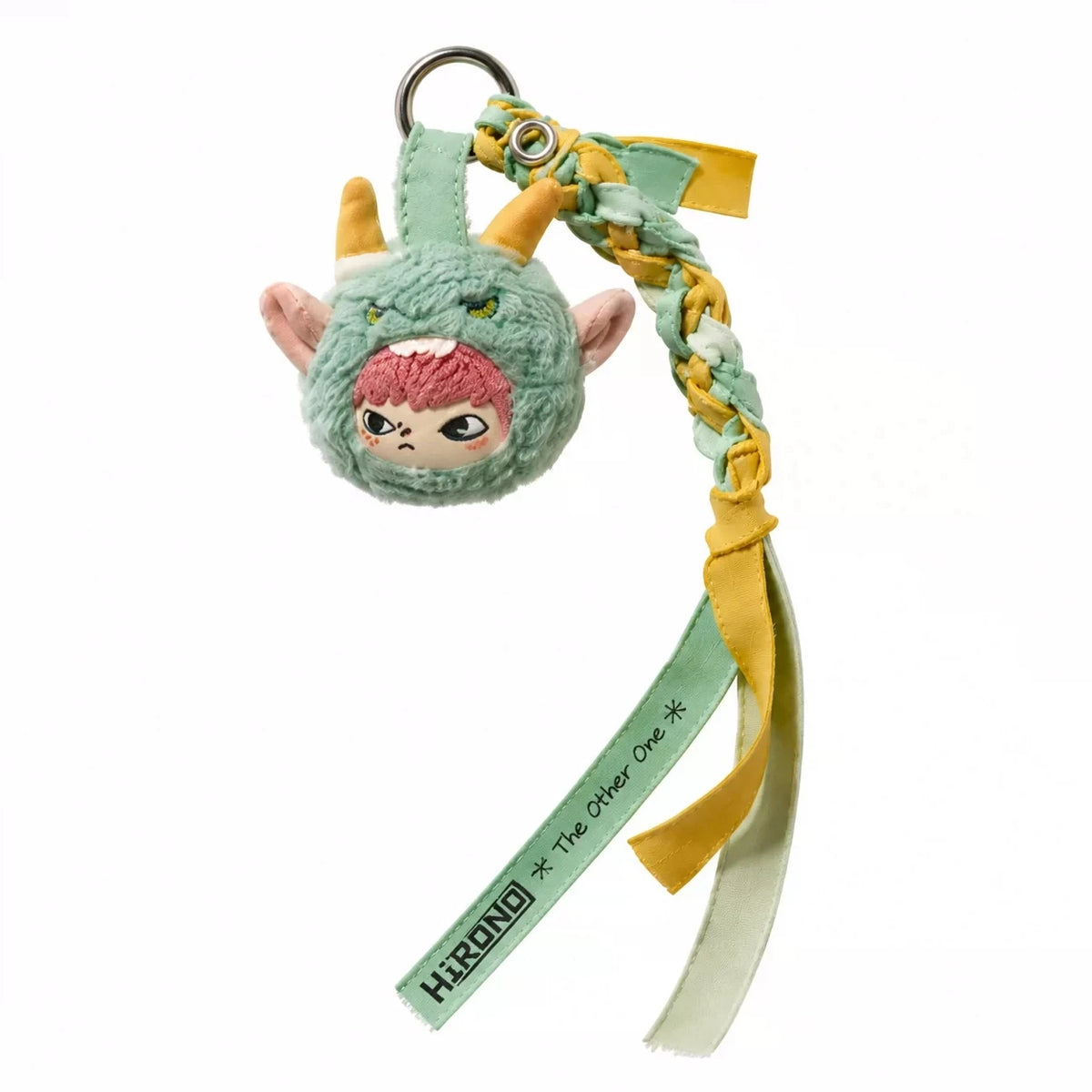 A plush keychain featuring a green creature with pink accents and a yellow strap.