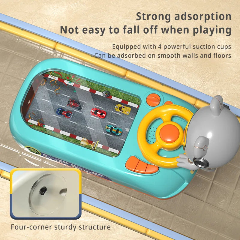 A light blue steering wheel driving toy with a gray animal figure is shown on a tiled floor.
