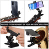 A black phone clip designed to attach to a guitar headstock for recording artistic creation.