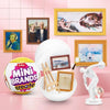 A collection of ZURU Mini Brands Masterpieces featuring various collectible figures and framed artwork.