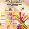 A wooden stacking tower game with colorful rods and balls used for children's thinking exercises.