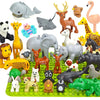 A collection of various zoo animals made from large building blocks, including elephants, lions, giraffes, and monkeys.