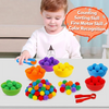A child is shown interacting with a rainbow sorting and counting toy set featuring colorful pom-poms and tweezers.
