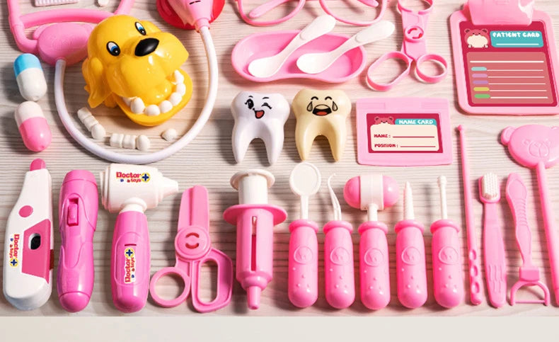 A collection of pink and yellow kids doctor play set accessories including a stuffed dog, dental tools, and various medical i