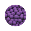 A close-up view of a pile of purple silicone beads for DIY jewelry making