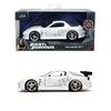 A white 1:32 scale diecast model of a 1993 Mazda RX-7 sports car.