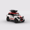 A detailed model of a classic sports car built from building blocks, featuring black and white paint and a black hood.
