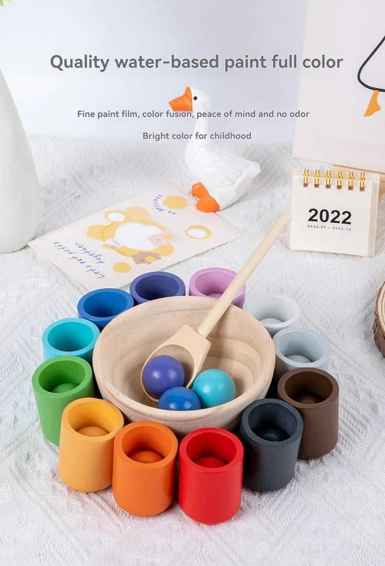 Montessori wooden color sorting game featuring rainbow balls and cups for children