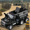A black SWAT City Police truck diecast toy with lights and sounds parked on a dirt road.