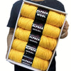 A box containing five skeins of yellow alpaca wool yarn for knitting and crochet projects.