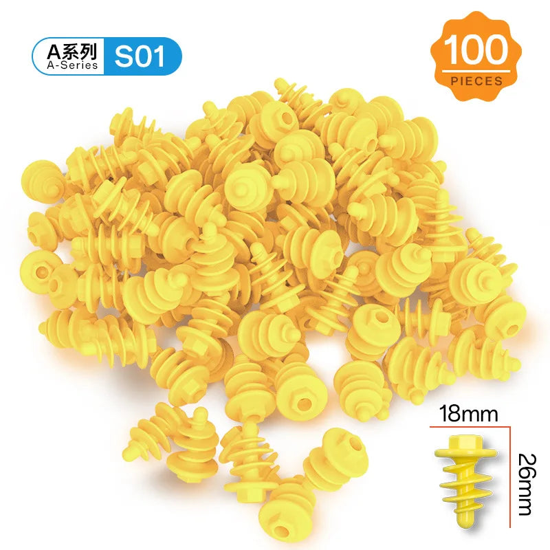 A pile of yellow spiral cardboard construction pieces for a kids activity kit