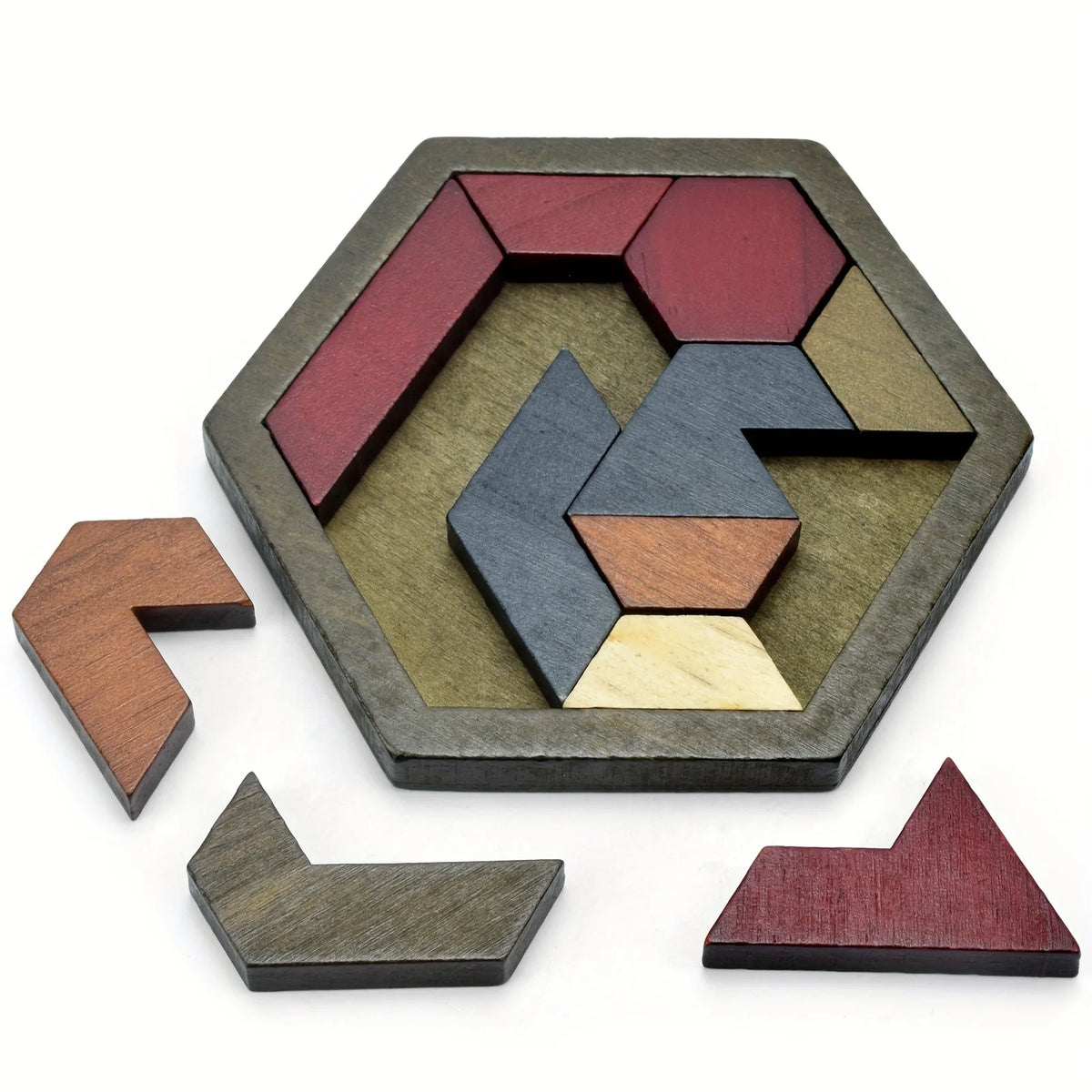 A wooden hexagon puzzle featuring various colored, angular pieces arranged within the frame.