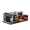 A detailed vintage American garage building blocks set featuring a multi-level structure with tools and machinery.