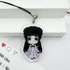 A clear acrylic pendant featuring an anime-style girl with black hair and a purple bow, attached to a black cord.