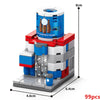 A mini city shop building block set featuring a cylindrical shop structure with a roof and surrounding buildings.