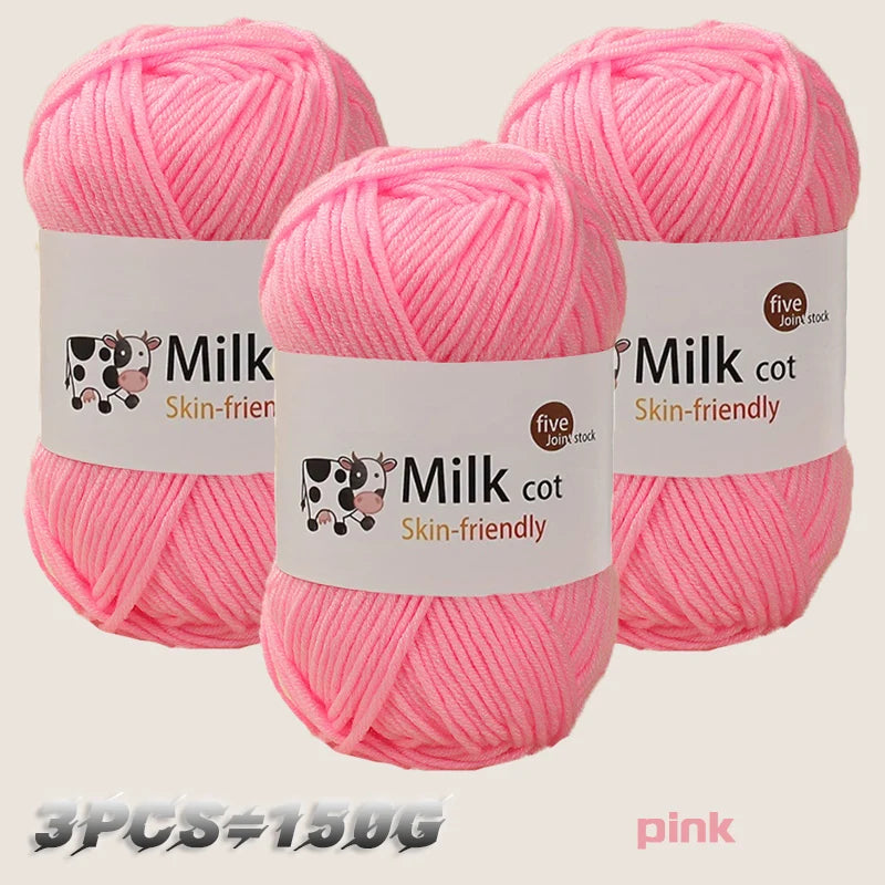 Three skeins of pink silk-friendly milk cot yarn are displayed against a light background.