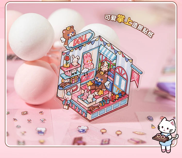 A box of Doll stickers featuring characters and scenery is displayed next to several white, round objects.